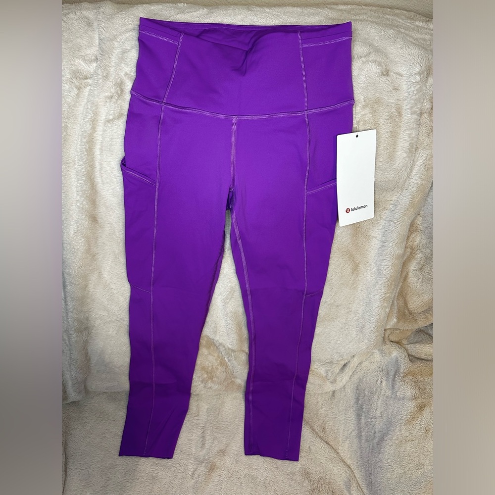New with Tags Lululemon Fast & Free 23” leggings size 4 purple